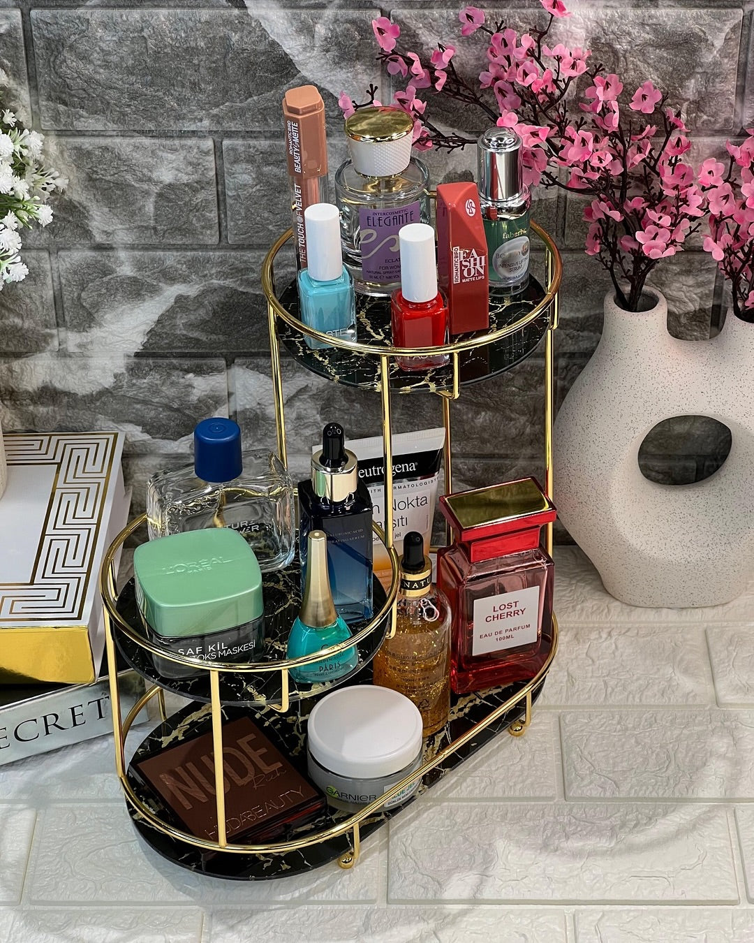 Multi-level Vanity Rack is Perfect for Keeping your Beauty Essentials Organized and Easily Accessible. With Multiple Levels and Compartments