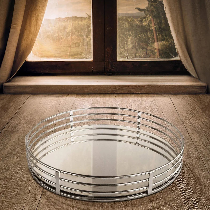 the perfect Circle Glass Tray-Silver Vanity Tray for all your vanity needs! This sleek, circular tray is designed to hold all your everyday essentials while adding a touch of elegance to your space