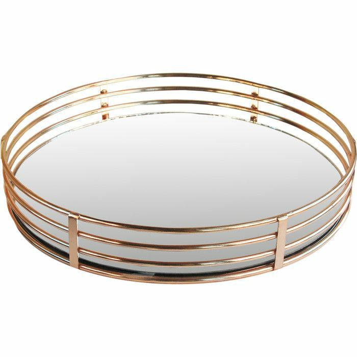 the perfect Circle Glass Tray-Silver Vanity Tray for all your vanity needs! This sleek, circular tray is designed to hold all your everyday essentials while adding a touch of elegance to your space