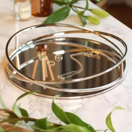 Luxury Silver Decorative Tray Elevate your space with our Luxury Silver Decorative Tray. Crafted with quality and style in mind,